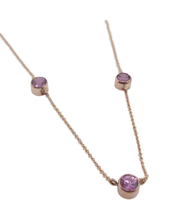 14K rose gold necklace bezel set with 3 = 1.86cttw rose sapphires.