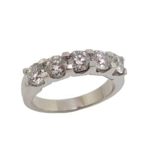 18K White gold 5 stone lady's band claw set with 1.252cttw I, VS1 ideal cut, round brilliant cut Hearts On Fire diamonds.