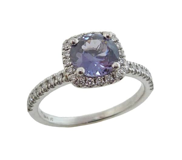 14K white gold cushion halo ring set in the centre with a 1.21ct grey-purple spinel and accented on the halo and band with 42 claw set, very good cut, round brilliant cut diamonds, 0.289cttw, G/H, SI1.