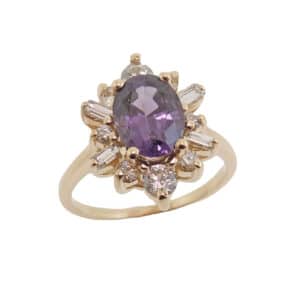 14K Yellow gold lady's coloured gemstone stylized halo lady's ring set with a 2.14 carat purple oval spinel and accented with 12 round brilliant cut diamonds, 0.78cttw, G/H, SI.