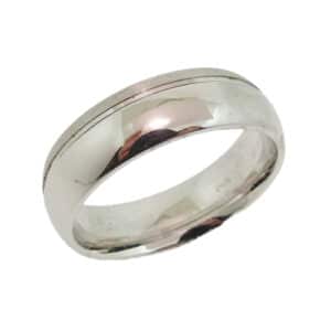 14 Karat white gold domed band with high polish and a stainless stripe.