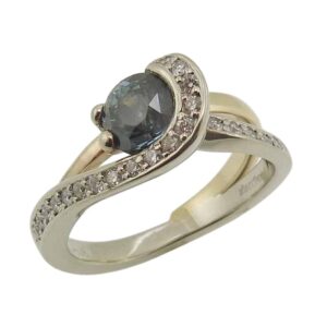 14K Yellow gold Toi et Moi engagement ring claw set with a 1.59 carat D, VVS2 radiant cut lab grown diamond and a 1.55 carat D, VVS2 pear brilliant cut lab grown diamond.