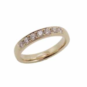 14K Yellow gold lady's pave set band set with 7 round brilliant cut diamonds, 0.35cttw, G/H, VS-SI.
