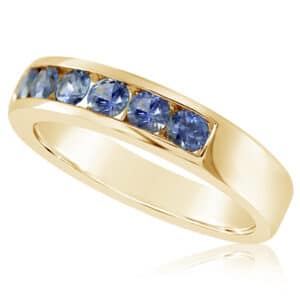 14K yellow gold ring channel set with 6 = 0.840cttw Montana Sapphires. 