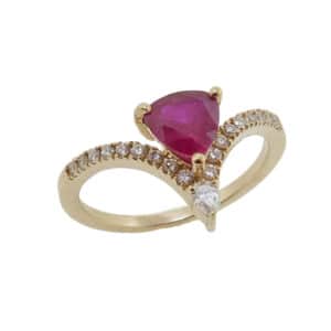 14K Yellow gold lady's  fashion ring set with a trillion cut 0.91ct Ruby and 19 round brilliant cut diamonds, 0.204cttw, F/G, SI1.