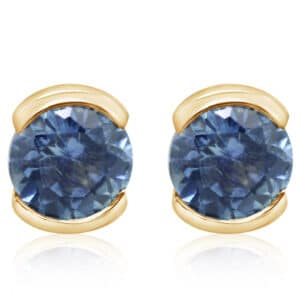 14K yellow gold stud earrings semi-bezel set with 2 = 0.60cttw Montana sapphires.