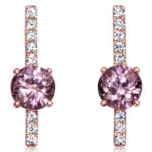 14K rose gold stud earrings set with 2 = 1.6cttw Lotus garnets and accented with 0.144cttw H/I, SI2, round brilliant cut diamonds.