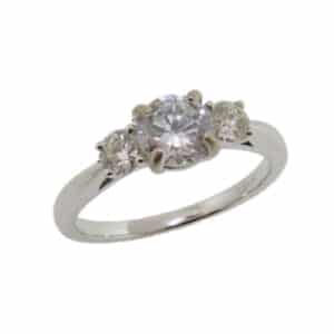 14K White gold engagement ring set with a 5.9mm round CZ and 2 round brilliant diamonds, 0.30 total carat weight, G/H, VS-SI.