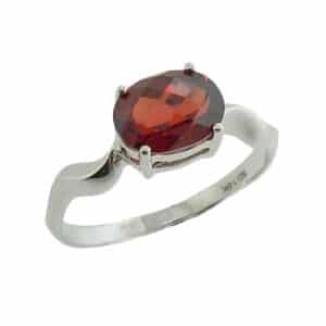 14K White gold lady's ring with wavy band and claw set centre 1.6 carat oval checkerboard cut red garnet.