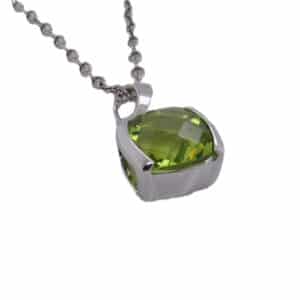 Lady's 14 K white gold pendant set with 2.40ct checkerboard cut peridot.