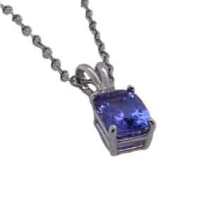 14K White gold lady's pendant set with an oval 1.0ct tanzanite and a 0.03ct round brilliant cut diamond.