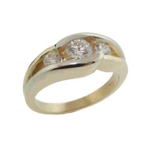 14K Yellow gold channel set custom engagement ring set in the centre with an ideal cut, round brilliant cut Hearts On Fire diamond, 0.427 carat, G, SI1 and two ideal cut, round brilliant cut Hearts On Fire diamonds, 0.278 total carat weight, G/H, VS-SI.