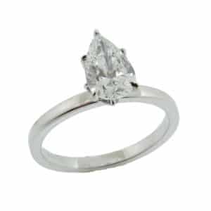 14K White gold engagement ring set with a 1.00 carat J, VS2 Pear brilliant cut diamond and accented on the head with four pear brilliant cut diamonds, 0.40cttw, G/H, SI.