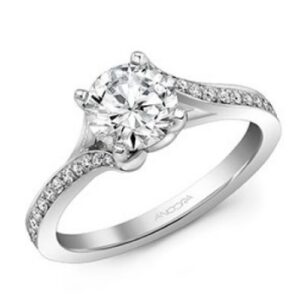 14K White gold engagement ring by Ancora Designs claw set in the centre with a 1.0 carat CZ and pave set on the band with 28 round brilliant cut diamonds, 0.21cttw, G/H, VS-SI. Available in 14K gold, 18K gold, or platinum. This ring can be made in any combination of white, pink or yellow gold and can be customized to accommodate different size and shape diamonds, by special order. Priced without a center gemstone. Let us find you the perfect center that fits your tastes and budget!