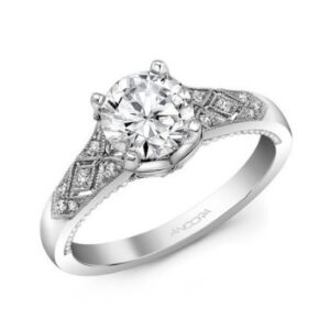 14K White gold art deco inspired engagement ring set by Ancora Designs set in the centre with a 0.75 carat CZ and accented on the band and profile with fourteen round brilliant cut diamonds, 0.10 total carat weight, G/H, VS-SI.