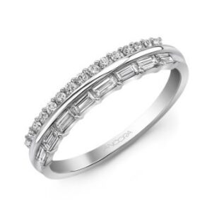 14K white gold diamond illusion stacked band by Ancora Design set with 8 baguettes totaling 0.22 carats and 15 round brilliant cut diamonds totaling 0.14 carats.