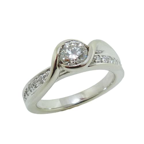 14K White diamond engagement ring bezel set with one ideal, round brilliant cut Hearts On Fire diamond, 0.474ct H, SI1 and pave set on the band with 0.28 total carat weight, excellent-very good cut diamonds, G/H, VS2-SI1.