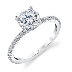14K White gold engagement ring known as Maryam by Sylvie Collection set with a 0.75 carat CZ and accented on the band and in the hidden halo with 0.37 total carat weight round brilliant cut diamonds, G/H, VS-SI. Available in 14K gold, 18K gold, or platinum. This ring can be made in any combination of white, pink or yellow gold and can be customized to accommodate different size and shape diamonds, by special order. Priced without a center gemstone. Let us find you the perfect center that fits your tastes and budget!