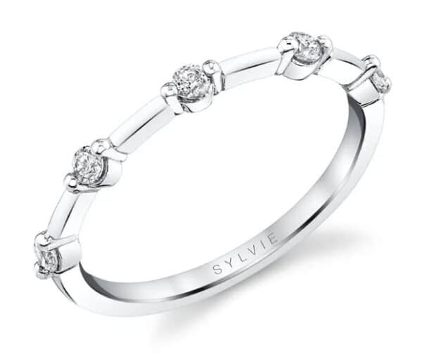 14K White gold lady's single prong set diamond band by Sylvie Collection, five round brilliant cut diamonds, 0.16 total carat weight.
