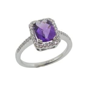 14K white gold lady's ring set with a 1.02 carat checkerboard cushion cut amethyst and accented in the halo, 0.145 total carat weight, and on the band, 0.024 total carat weight, with excellent cut side diamonds, G/H, VS/SI.