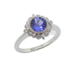 14KW Ancora lady's ring set with: - 0.84ct tanzanite - 14 very good, round brilliant cut diamonds, 0.12cttw, G, SI1