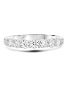 14K white gold diamond ladies band, claw-set with seven round brilliant cut diamonds, totaling 0.70 carats, G-H, VS-SI. 