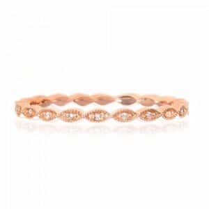 14K Rose gold scalloped lady's band set with 11 round brilliant cut diamonds, 0.03 total carat weight.