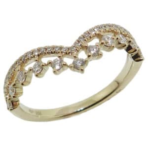 14K Yellow lady's diamond chevron band, set with forty-two round brilliant cut diamonds, totaling 0.29 carats, G-H, VS-SI. 