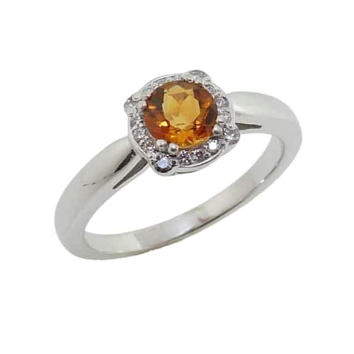 14K White gold lady's ring claw set in the centre with a 0.48 carat citrine and with 0.087 total carat weight Hearts On Fire diamonds, G/H, VS-SI in the halo. 