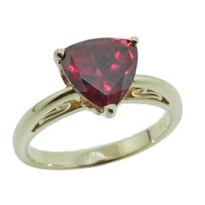 10K yellow gold ring set with a 2.285ct trillion cut rhodolite garnet. This piece is perfect to represent January birthdays.