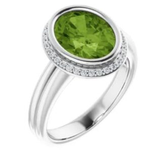 10k white gold and diamond ring featuring a 2.57ct Peridot
