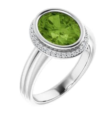 10k white gold and diamond ring featuring a 2.57ct Peridot