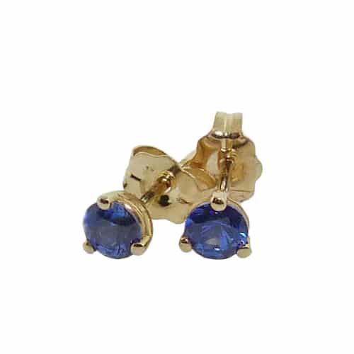 14 karat yellow gold blue sapphire stud earrings set with two round blue sapphires totaling 0.89 carats.