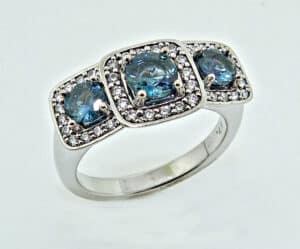 Three stone engagement ring set with Montana sapphires