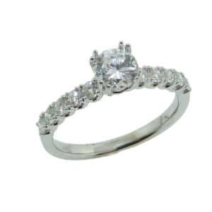14K White gold engagement ring set in the centre with a 0.5-0.6 carat CZ and 10 round brilliant cut diamonds, 0.41 total carat weight. 