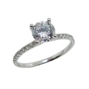 14K White gold solitaire engagement ring set with a 0.75 carat CZ and accented on the band with 18 round brilliant cut diamonds, 0.17 total carat weight. 