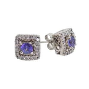 14 Karat white gold coloured gemstone and diamond halo earrings set with two round tanzanites totaling 0.553 carats and forty round brilliant cut diamonds totaling 0.33 carats, G/H, SI-VS.