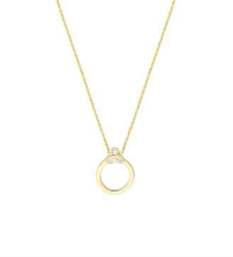 14 Karat yellow gold diamond pendant known as "Trinity Door Knocker Pendant" set with three round brilliant cut diamonds totaling 0.18 carats, G/H, SI.