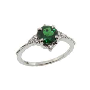 14K White gold lady's ring set with a 1.14 carat Tsavorite Garnet and 8 round brilliant cut, 0.12 total carat weight, H/I, SI.