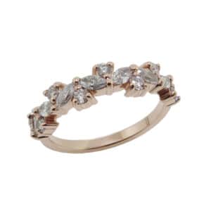 14K Rose gold lady's scattered diamond band claw set with 8 round brilliant cut diamonds, excellent cut, F/G, SI1, 0.255 total carat weight and 7 marquise diamonds, F/G, VS-SI, 0.40 total carat weight.