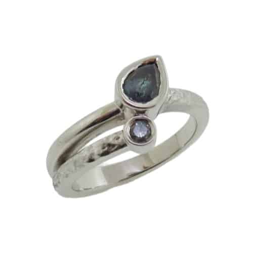 14K White gold lady's "moi et toi" ring with a bezel set 0.77 carat pear shape Alexandrite and a 0.058ct excellent cut, round brilliant cut diamond, F/G, SI1.