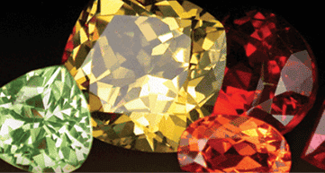 green, yellow, orange and yellow gemstones