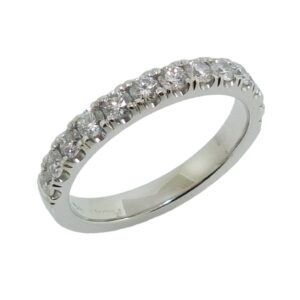 Lady's 14K white gold diamond band set with thirteen round brilliant cut diamonds totaling 0.65 carats, G-H, VS-SI, very good cut.