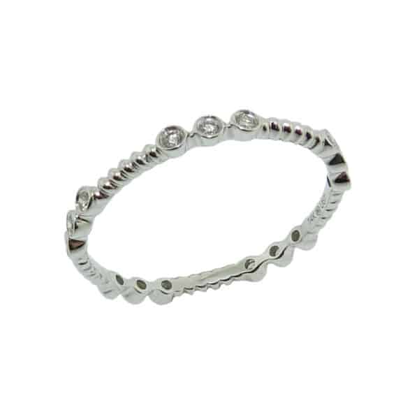 14K White gold beaded and diamond station band set with 0.15cttw, I/J, Si2-I1, very good cut round brilliant cut diamonds.