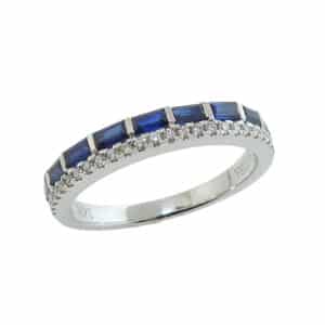 14K White gold lady's band set with 25 round brilliant cut diamonds, 0.13cttw, and 9 baguette sapphires, 0.55cttw.