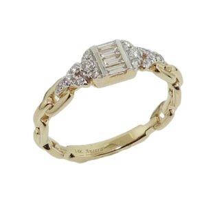 14K Yellow gold baguette fashion ring channel set with 4 baguette diamonds, 0.11cttw, and 16 round brilliant cut diamonds, 0.10cttw.