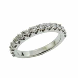 14K White gold diamond lady's band claw set with 15 round brilliant cut diamonds, 0.75cttw, G/H, VS-SI.