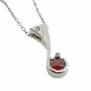 14K White custom pendant set with a 0.60 carat garnet and accented with 2 round brilliant cut diamonds, 0.015ctw, G/H, I1.