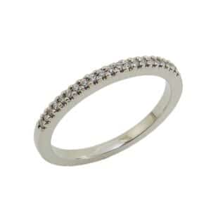 14K White gold lady's diamond band claw set with 21 round brilliant cut diamonds, 0.11 total carat weight, G/H, VS-SI.