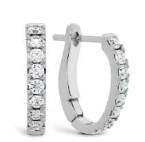 18K white gold Mini hoop graduated diamond hoops set with 16 ideal, round brilliant cut diamonds by Hearts On Fire, totaling 0.30 carats, I-J, VS-SI.